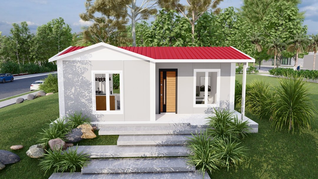a-small-modern-prefabricated-house-with-a-red-roof-ma3kwywisz4